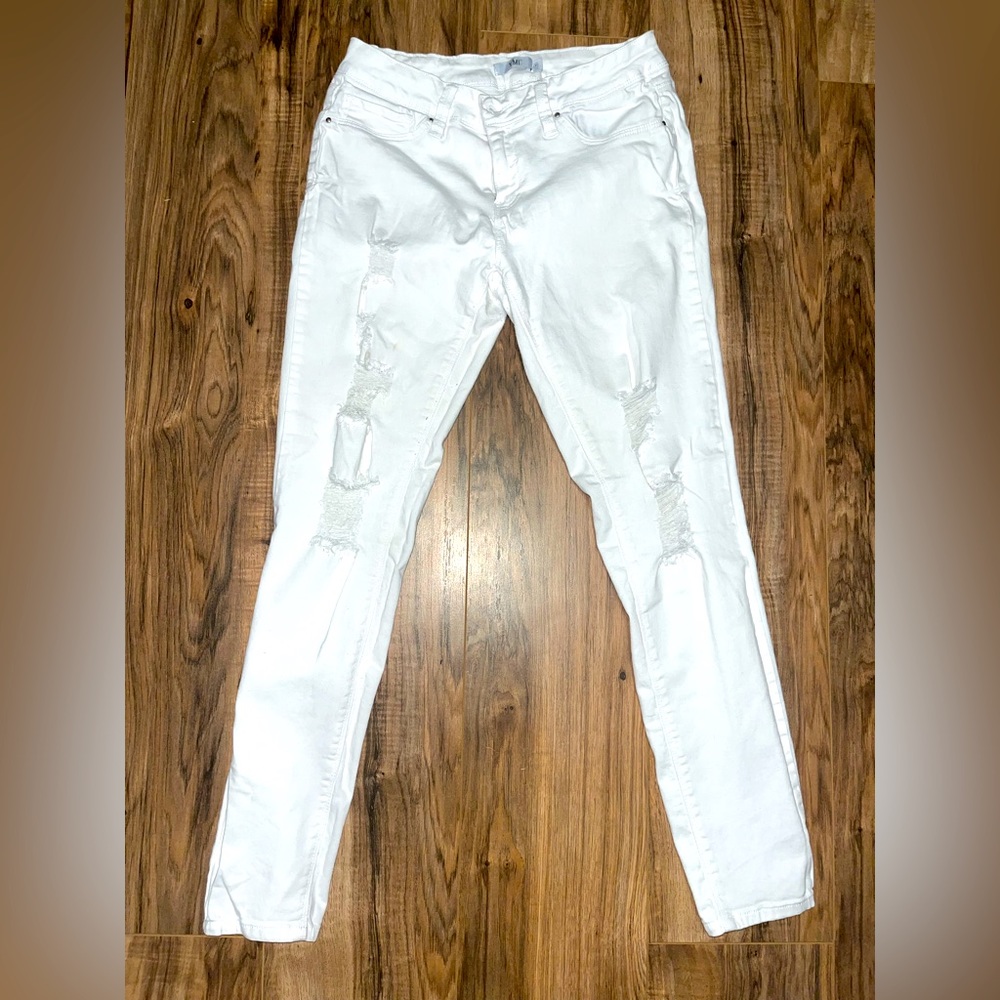 White jeans with holes